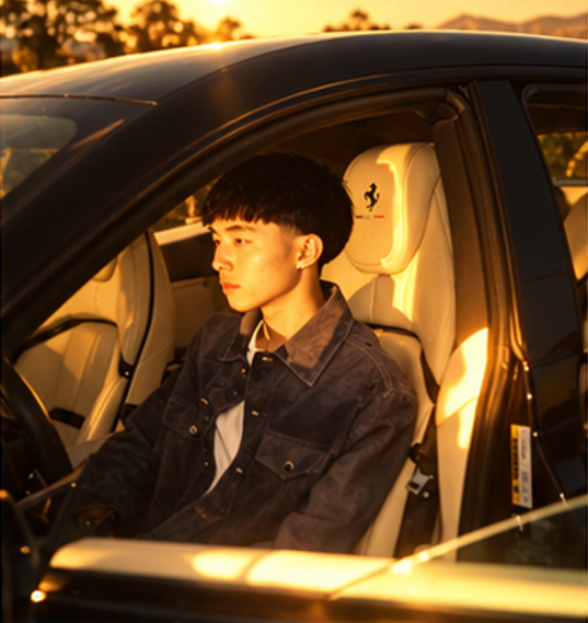 Kimchi Boss in the driver seat of a Ferrari at dusk